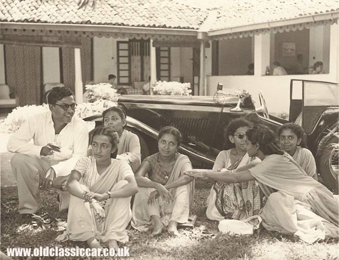 People in Ceylon with an MG sportscar