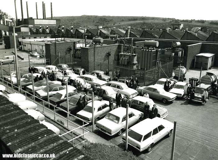 Vauxhalls outside the factory
