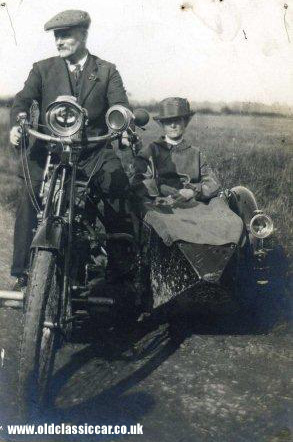 An Indian motorcycle with sidecar attached