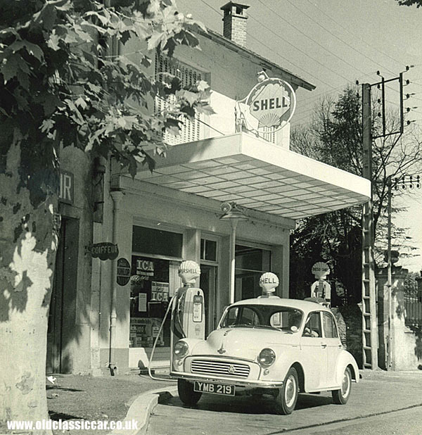 A Shell garage in France, with a Minor parked outside