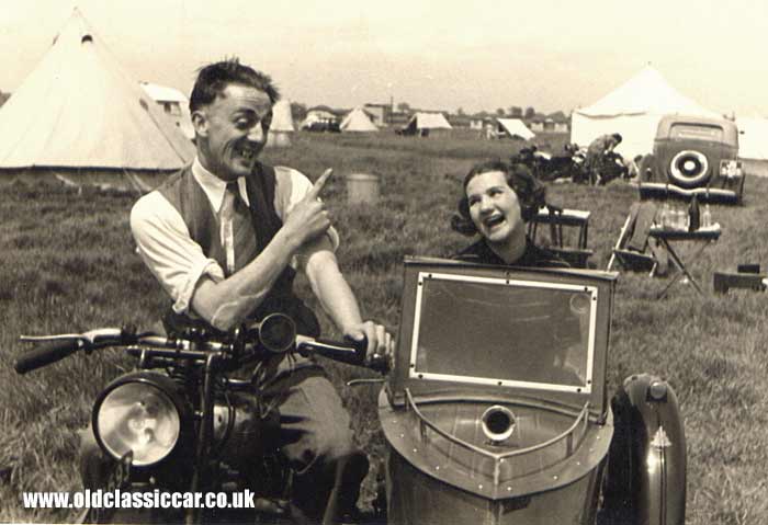 Two people and their sidecar combination in 1938